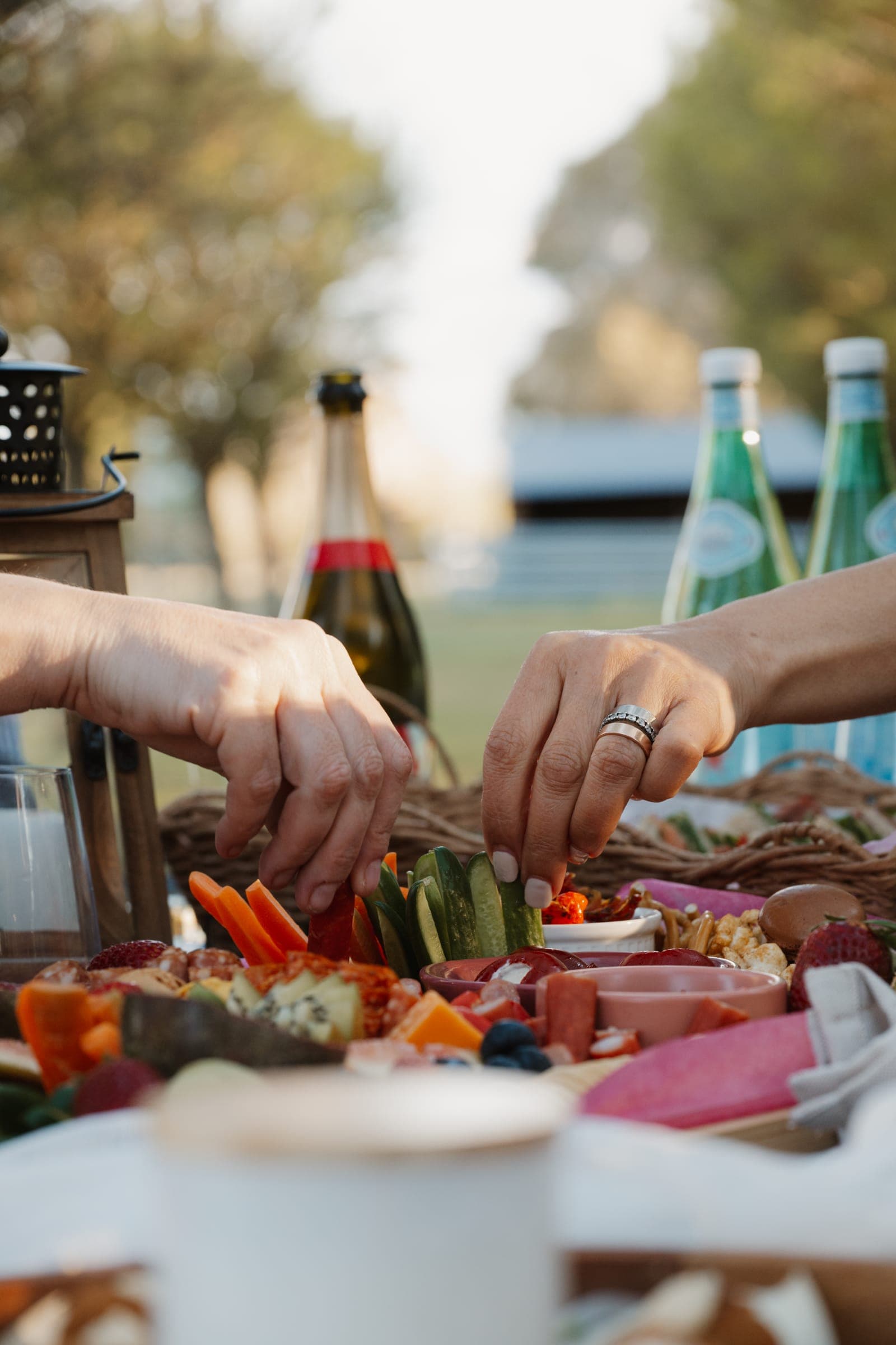 Guests reaching across a grazing board